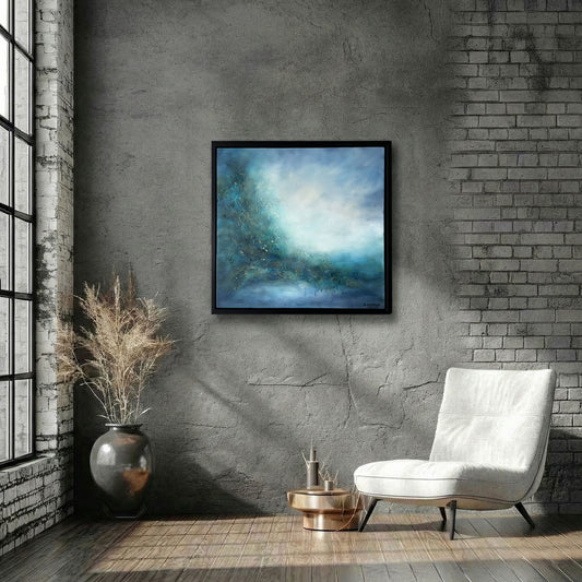 Sinéad Guilfoyle original abstract painting 'Our Sacred Land' featuring deep teal, ethereal blue, and gold textures, styled in a moody industrial living room with a grey brick wall and a modern white lounge chair.