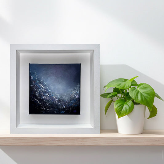 Bright interior decor featuring 'Lavender Dawn II' abstract artwork by Sinéad Guilfoyle on a warmly lit shelf.
