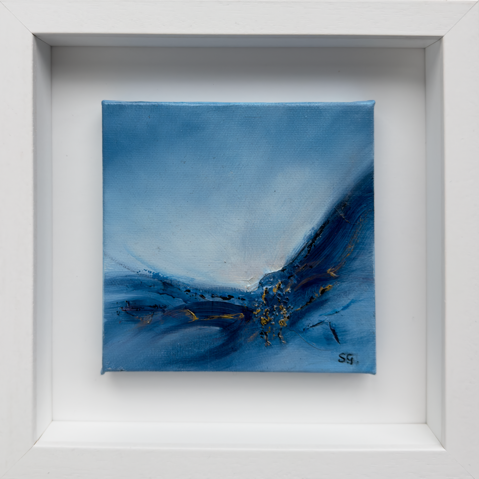 Emergence 1 by Sinead Guilfoyle: Original blue and gold textured abstract art in a minimalist white frame.