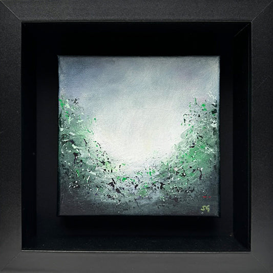 Through the Green Haze by Sinéad Guilfoyle: Small original abstract painting with vibrant green, white, and black speckled textures, presented in a deep-set black shadow box frame.
